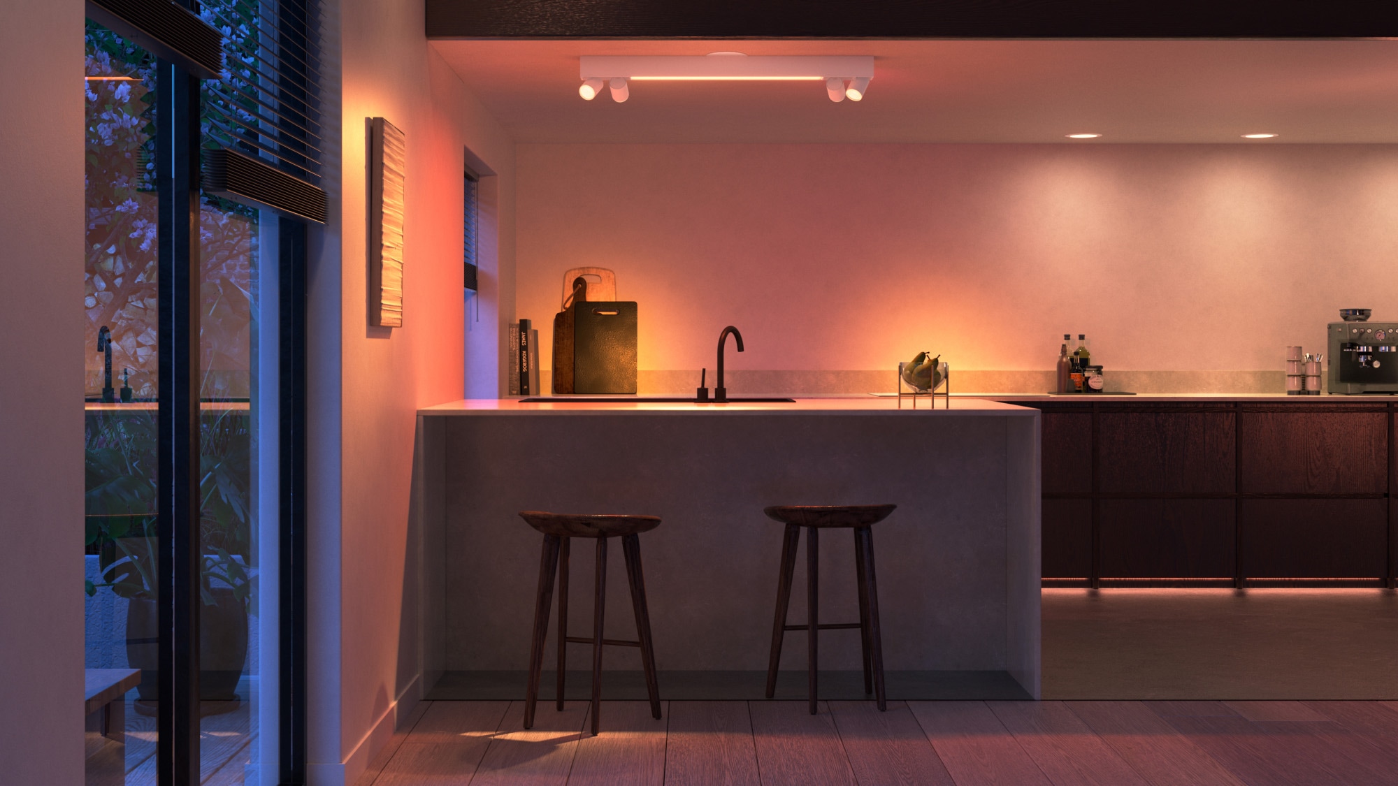 Warm kitchen lighting scene with under-cabinet and pendant lights